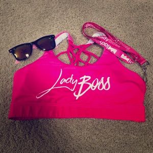 Ladyboss sport bra with sunglasses and lanyard